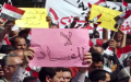 مراقبون: الديمقراطية في العراق مختزلة بالانتخابات ويهددها السلاح والطائفية والفساد